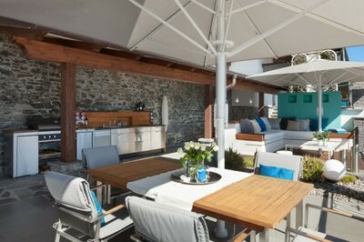 © Shutterstock / alexandre zveiger architecture, balcony, chair, decor, design, dining, divan, exterior, furniture, home, hotel, house, kitchen, leisure, lounge, luxury, modern, nobody, outdoor, outside, parasol, patio, relax, relaxation, style, sunny, table, terrace, travel, vacation, veranda, view, white