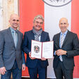Herbert Preuhs, Ernst Gmeiner und Bundesminister Dr. Martin Kocher (v.l.n.r)