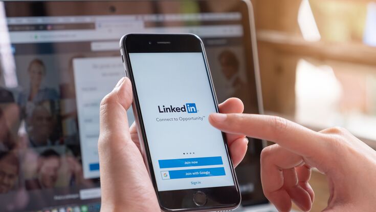 CHIANG MAI, THAILAND - AUG 26, 2018: iPhone X with LinkedIn application on the screen. LinkedIn is a business-oriented social networking service.